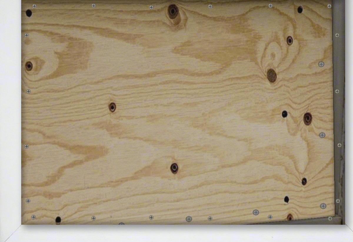Opening boarded with structural plywood